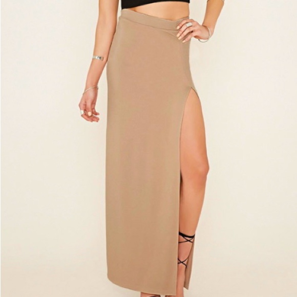 Tan long casual skirt with slit comfortable material. Size Large &stretchy.